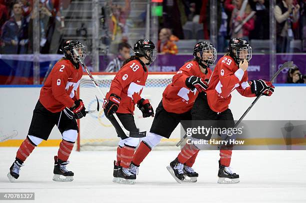 Marie-Philip Poulin of Canada celebrates with teammates after her goal in the third period against the United States during the Ice Hockey Women's...