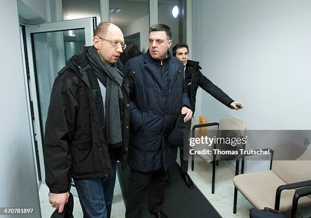 Leader of All-Ukrainian Union 'Fatherland' Arseni Jazenjuk and leader of All-Ukrainian Union 'Svoboda' Olej Tjahnybok leave after meeting with the...