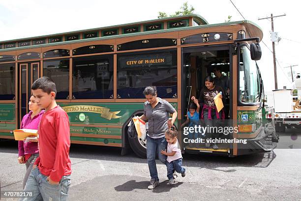 central american refugees, south texas, summer 2014 - mcallen texas stock pictures, royalty-free photos & images