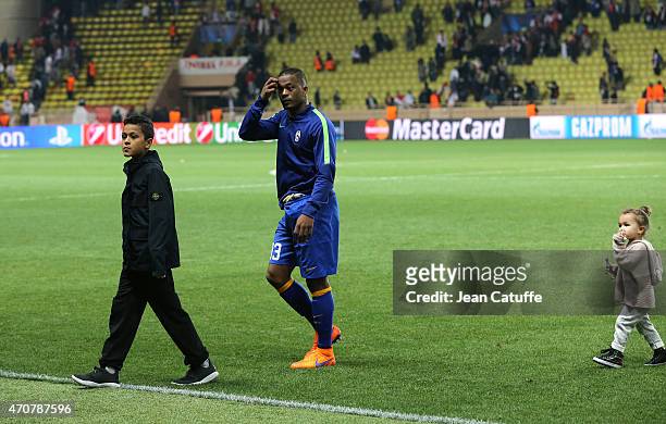 Patrice Evra of Juventus and his children Lenny Evra and Maona Evra walk on the pitch after the UEFA Champions League Quarter Final second leg match...