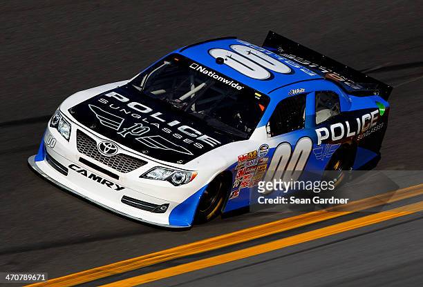 Jason White, driver of the Police Sunglasses/Friday Night Tykes Toyota, practices for the NASCAR Nationwide Series DRIVE4COPD 300 at Daytona...