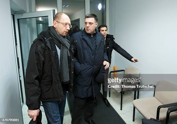 Leader of All-Ukrainian Union 'Fatherland' Arseni Jazenjuk and leader of All-Ukrainian Union 'Svoboda' Olej Tjahnybok leave after their meeting with...