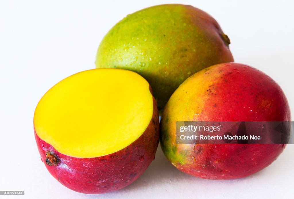 Realistic approach to tropical fruits: three  imperfect ripe...