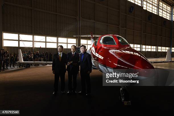Takanobu Ito, outgoing president of of Honda Motor Co., center, Michimasa Fujino, president of Honda Aircraft Co., right, and Yoshiharu Yamamoto,...