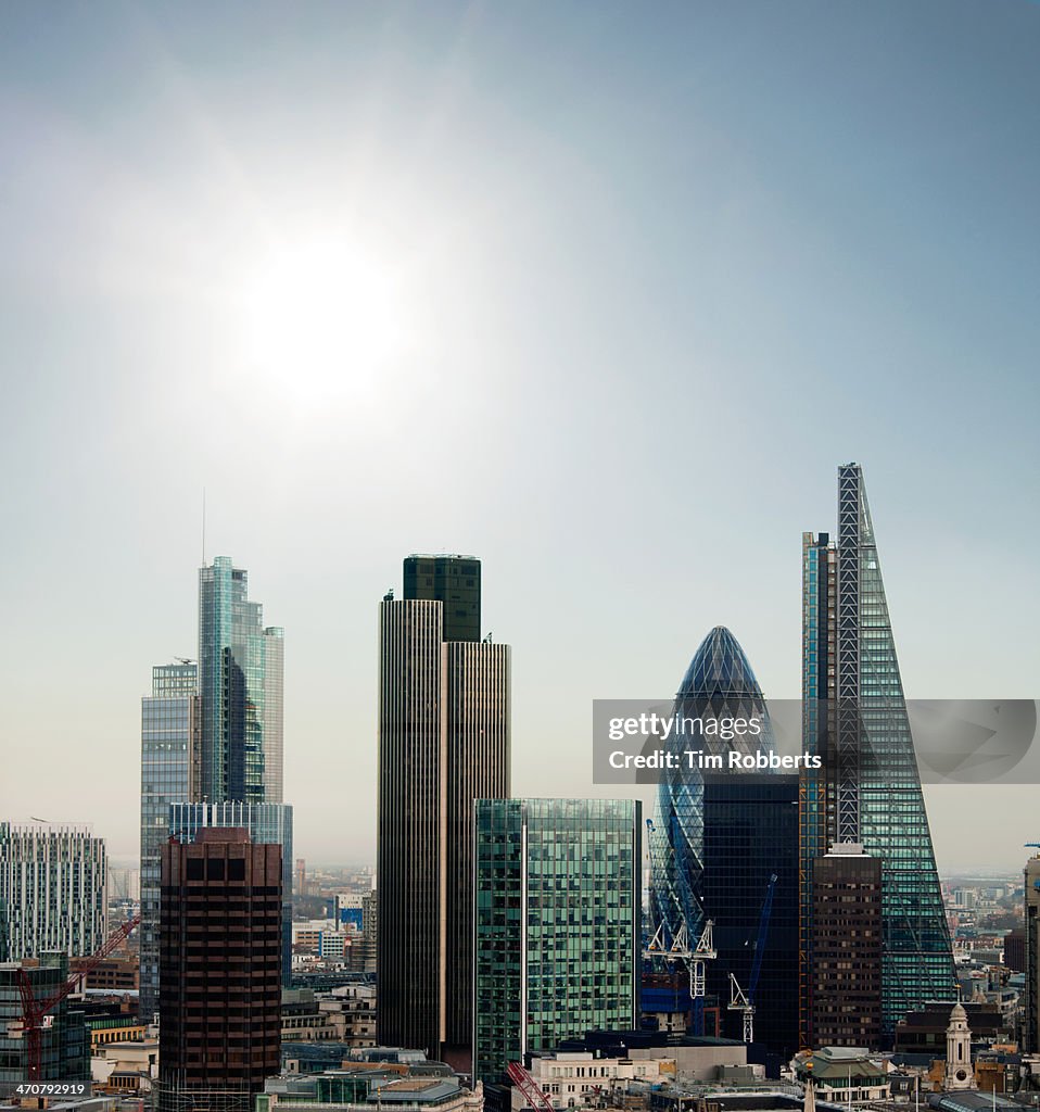 The City of London financial district with sun