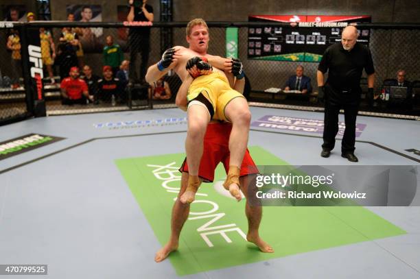 Team Canada fighter Sheldon Westcott takes down Team Australia fighter Daniel Kelly in their middleweight fight during filming of The Ultimate...