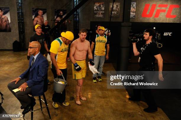 Team Australia fighter Daniel Kelly walks to the locker room after being submitted by Team Canada fighter Sheldon Westcott in their middleweight...