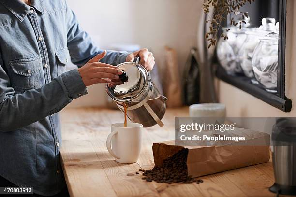 her first cup in the morning - make stockfoto's en -beelden