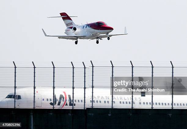 HondaJet prepare to land at Tokyo International Airport on April 23, 2015 in Tokyo, Japan. The 13-meter-long aircraft can carry seven passengers and...