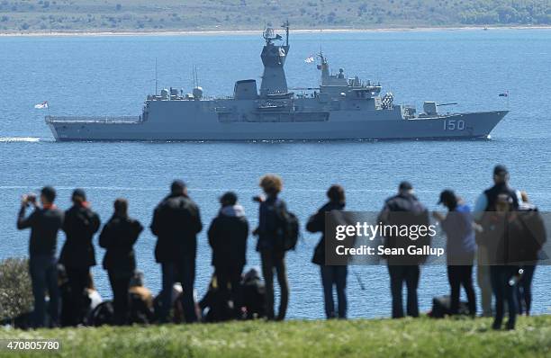 Anzac of the Australian Navy passes by Australian visitors at Helles Point, where Allied soldiers fought during the Gallipoli Campaign, ahead of...