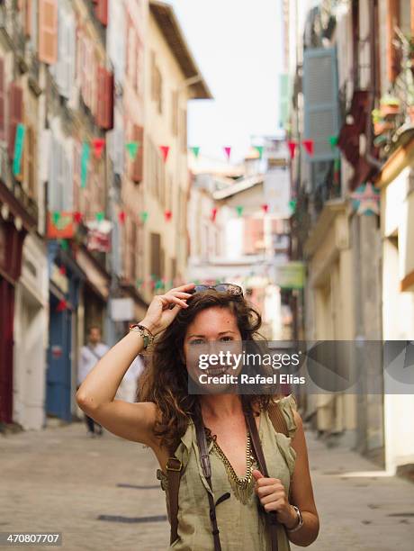 Pretty woman in the street during local holidays