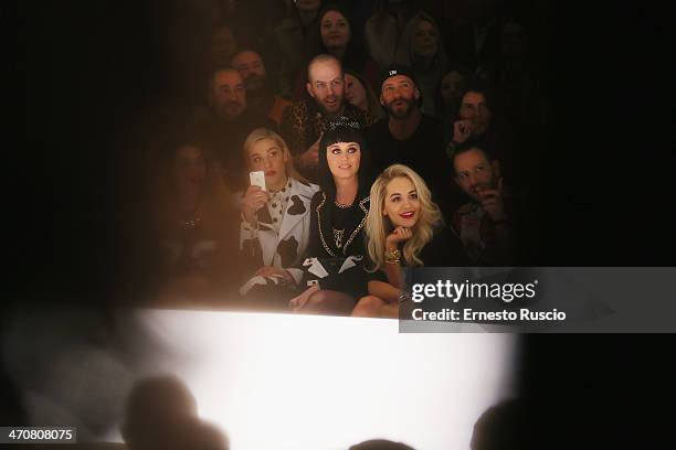 Mia Moretti, Katy Perry and Rita Ora attend the Moschino fashion show during Milan Fashion Week Womenswear Autumn/Winter 2014 on February 20, 2014 in...