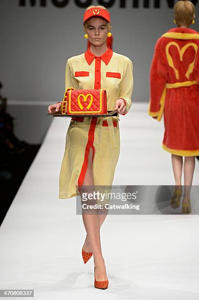 Model walks the runway at the Moschino Autumn Winter 2014 fashion show during Milan Fashion Week on February 20, 2014 in Milan, Italy.