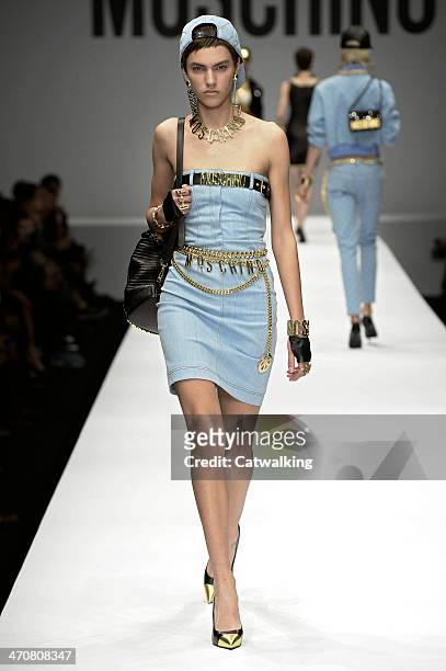 Model walks the runway at the Moschino Autumn Winter 2014 fashion show during Milan Fashion Week on February 20, 2014 in Milan, Italy.