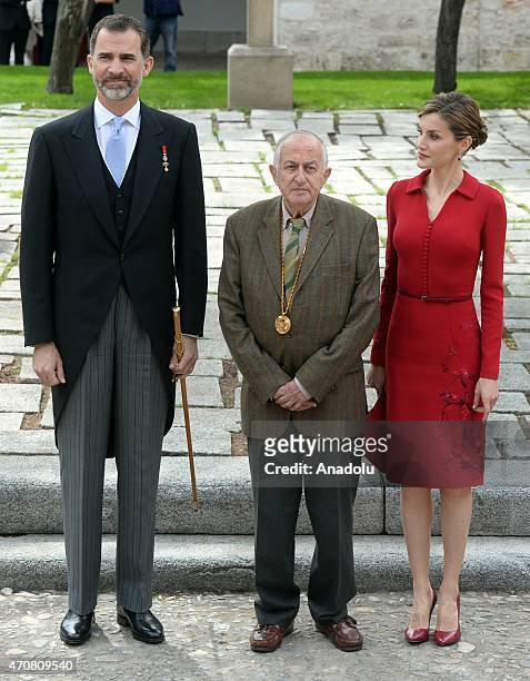 Spain's King Felipe VI, Queen Letizia and Spanish writer Juan Goytisolo, winner of the Cervantes prize, pose for photographers as they arrive at the...