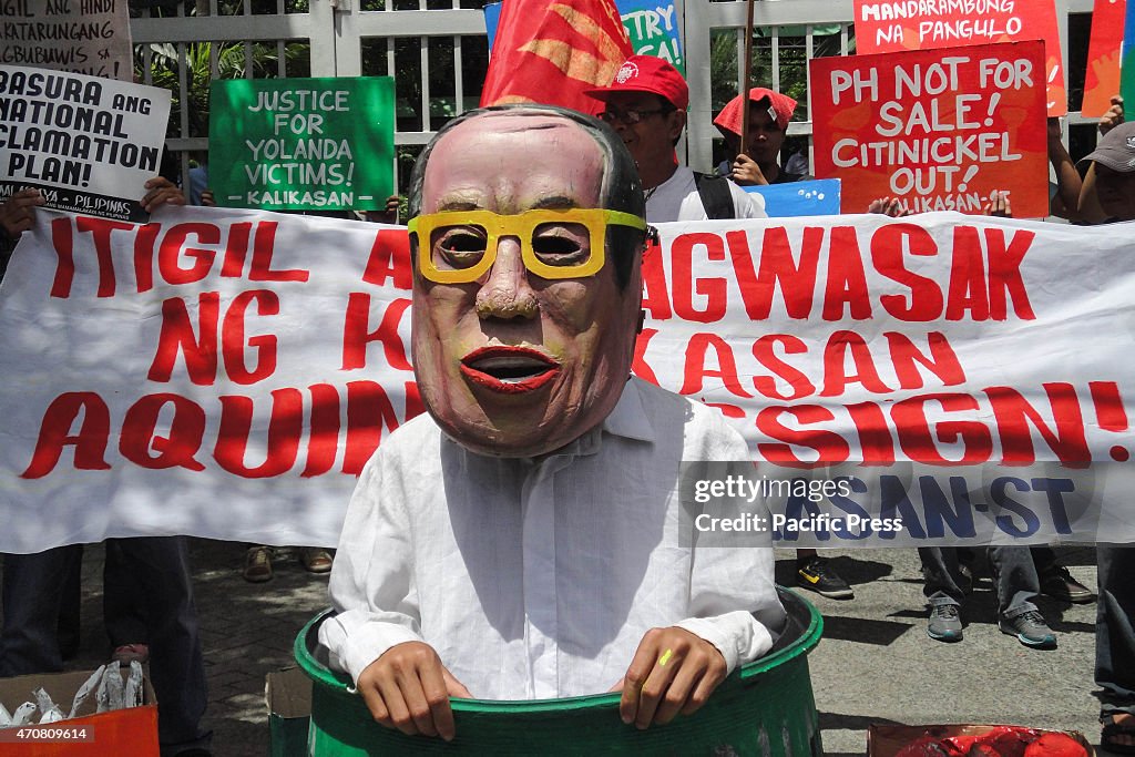 A Filipino protester impersonating Philippine President...