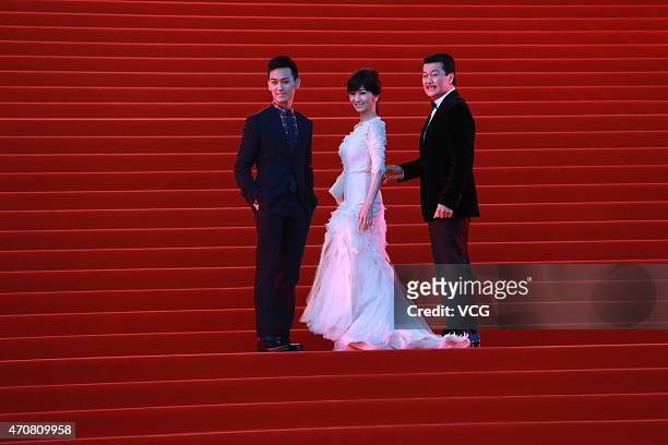 Actress Angie Chiu and her husband actor Melvin Wong walk the red carpet during the closing ceremony of the 5th Beijing International Film Festival...