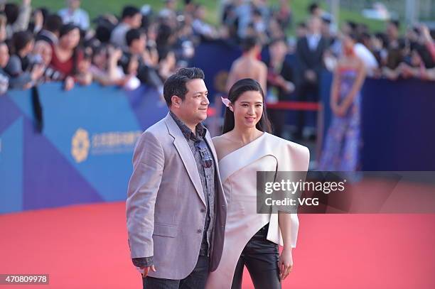Actress Gong Beibi and director Dayyan Eng walk the red carpet during the closing ceremony of the 5th Beijing International Film Festival at Beijing...