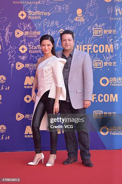 Actress Gong Beibi and director Dayyan Eng walk the red carpet during the closing ceremony of the 5th Beijing International Film Festival at Beijing...