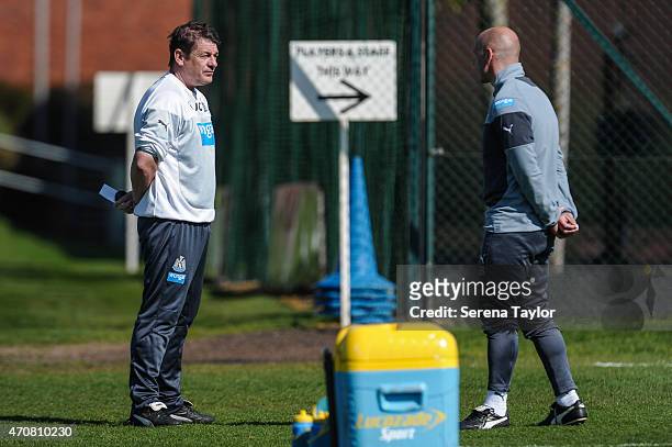 Head coach John Carver talks to coach Steve Stone during a Newcastle United Training session at The Newcastle United Training Centre on April 23 in...