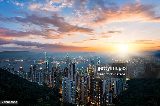 hong kong cityscape - sonnenaufgang stock-fotos und bilder
