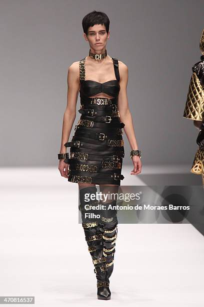 Model walks the runway during the Moschino show as a part of Milan Fashion Week Womenswear Autumn/Winter on February 20, 2014 in Milan, Italy.