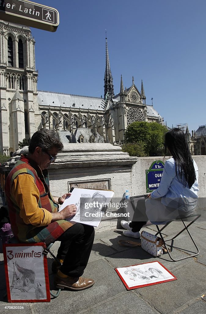 Tourists Visit Notre-Dame De Paris