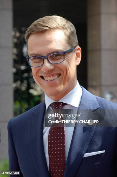 Finland's Prime minister Alexander Stubb addresses reporters upon his arrival at the European Council headquarters for an extraordinary summit of...