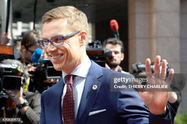 Finland's Prime minister Alexander Stubb addresses reporters upon his arrival at the European Council headquarters for an extraordinary summit of...