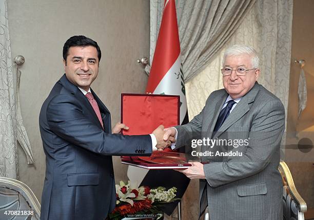 Co-chair of pro-Kurdish Peoples' Democratic Party Selahattin Demirtas meets with Iraqi President Fuad Masum in Ankara, Turkey on April 23, 2015.