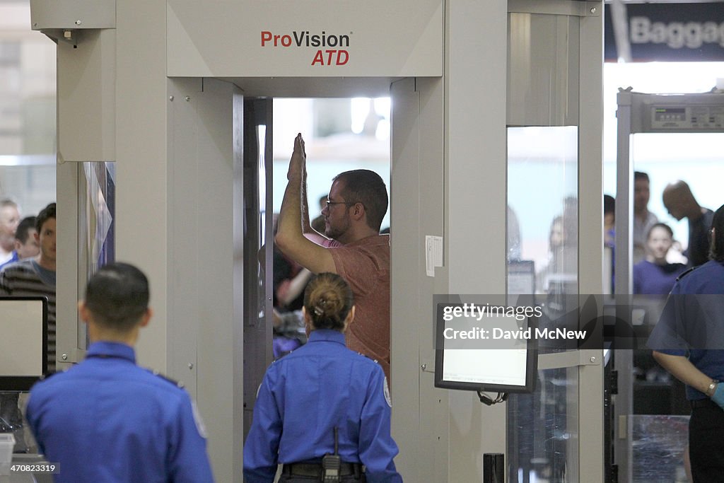 Homeland Security Chief Jeh Johnson Tours TSA Security Operation At LAX