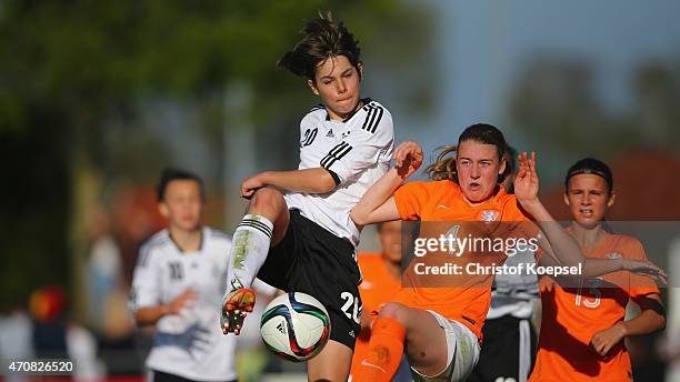 Lisa Doorn of Netherlands challenges Lena Sophie Oberdorf of Germany during the U15 girl's international friendly match between Germany and...