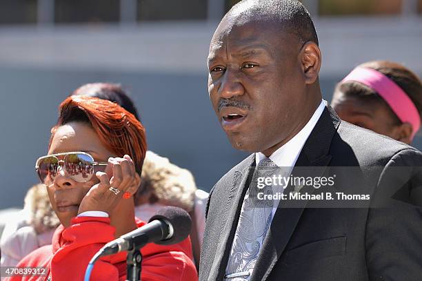 Brown family attorney, Benjamin L. Crump speaks to the media along with Lesley McSpadden, mother of slain 18-year old Michael Brown Jr. During a...