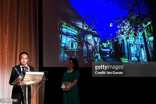 Yong Lin Tan with his Youth award and presenter Francesca Sears, Director of Panos Pictures on stage at the Sony World Photography Awards 2015 held...