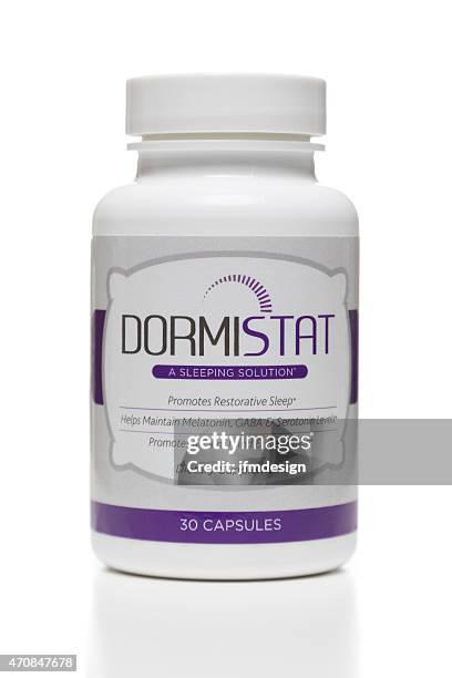 dormistat dietary supplement jar - melatonin stock pictures, royalty-free photos & images