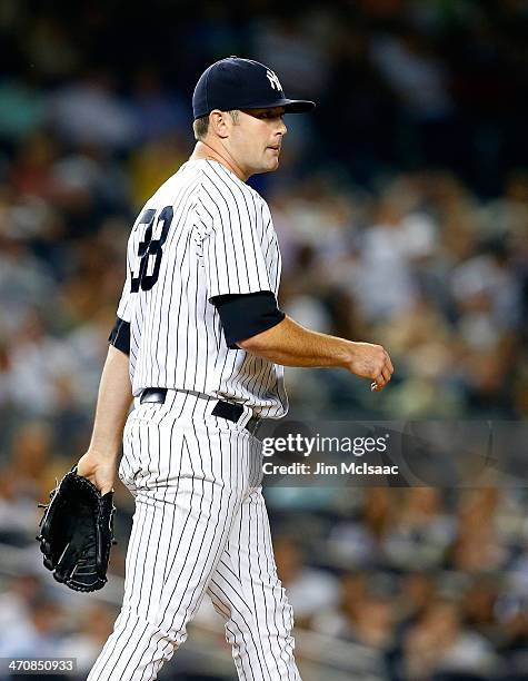 Preston Claiborne of the New York Yankees in action against the Toronto Blue Jays at Yankee Stadium on August 20, 2013 in the Bronx borough of New...