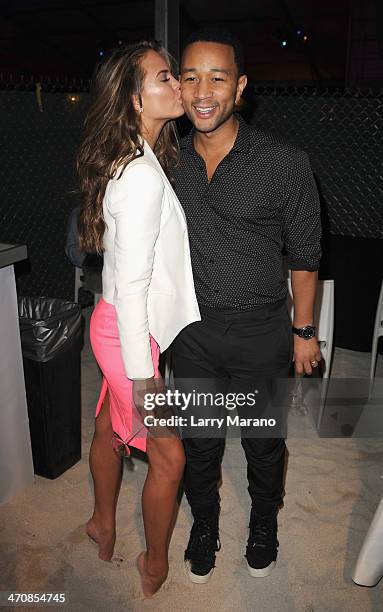 Chrissy Teigen and John Legend attend Moet Hennessy's The Q presented by Creekstone Farms sponsored by Miami Magazine hosted by Michael Symon...