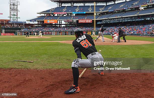 Ichiro Suzuki of the Miami Marlins stretches on deck in the fifth inning against the Philadelphia Phillies at Citizens Bank Park on April 23, 2015 in...