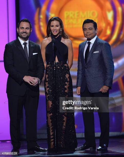 Enrique Santos, Argelia Artilano, and Raul Bryndis speaks onstage at Premio Lo Nuestro a la Musica Latina 2014 at American Airlines Arena on February...