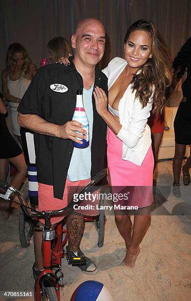 Chef Michael Symon and Chrissy Teigen attends Moet Hennessy's The Q presented by Creekstone Farms sponsored by Miami Magazine hosted by Michael Symon...