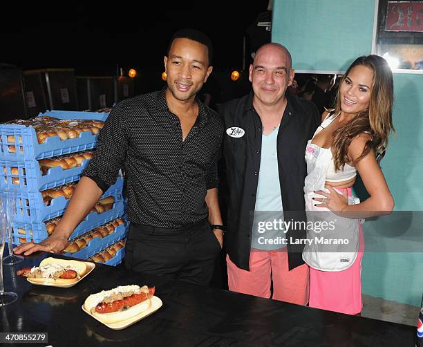 John Legend, Chef Michael Symon and Chrissy Teigen attend Moet Hennessy's The Q presented by Creekstone Farms sponsored by Miami Magazine hosted by...