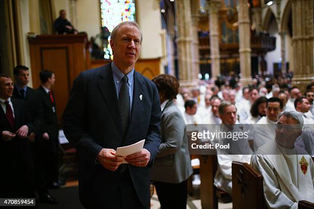 Illinois Governor Bruce Rauner attends the funeral Mass of Cardinal Francis George on April 23, 2015 in Chicago, Illinois. George died on April 17...