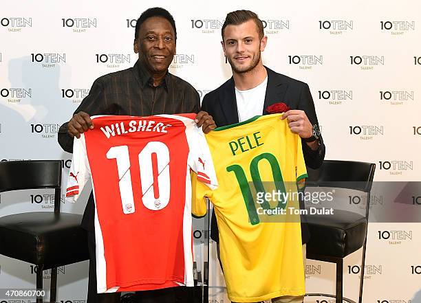 Founding clients of 10Ten Talent Pele and Jack Wilshere pose for photographs during the Launch of 10Ten Talent on April 23, 2015 in London, England.
