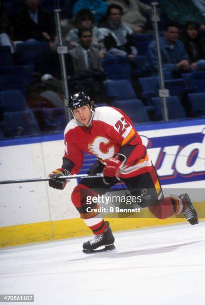 Sheldon Kennedy of the Calgary Flames skates on the ice during an NHL game against the New York Islanders on February 15, 1996 at the Nassau Coliseum...