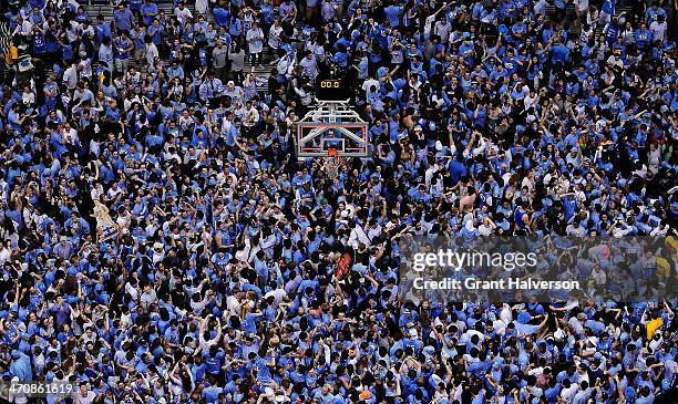 North Carolina Tar Heels fans storm the court after a win over the Duke Blue Devils during their game at the Dean Smith Center on February 20, 2014...