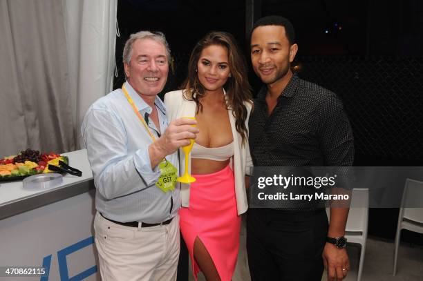 Moet Hennessy USA CEO Jim Clerkin, Chrissy Teigen, and John Legend attend Moet Hennessy's The Q presented by Creekstone Farms sponsored by Miami...