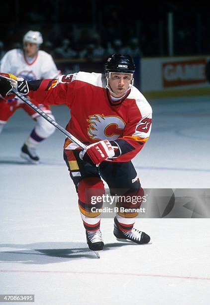 Sheldon Kennedy of the Calgary Flames skates on the ice during an NHL game against the Winnipeg Jets on January 20, 1995 at the Winnipeg Arena in...