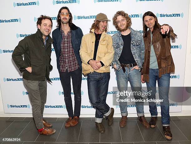 Musicians Taylor Goldsmith, Wylie Gelber, Tay Strathairn, Griffin Goldsmith and Duane Betts of band Dawes, visit SiriusXM Studios on April 23, 2015...
