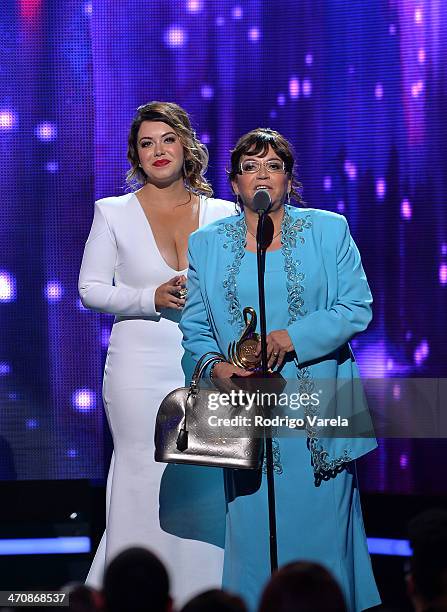 Chiquis River and Jenni Rivera speak onstage at Premio Lo Nuestro a la Musica Latina 2014 at American Airlines Arena on February 20, 2014 in Miami,...