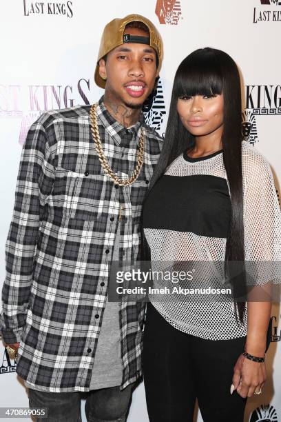 Rapper Tyga and Blac Chyna attend the exclusive press preview of Tyga's new store, Last Kings Flagship Store, on February 20, 2014 in Los Angeles,...